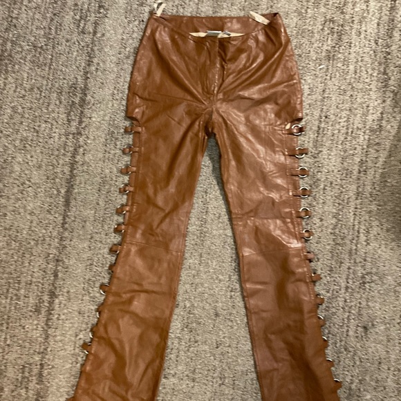 Wilsons Leather Pants - Wilson’s Vintage brown leather pants with cut out seam and metal loop hardware,